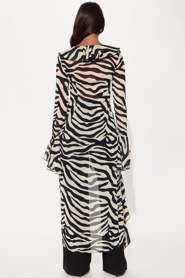 Zebra Print Ruffle Trim Long Sleeve Top