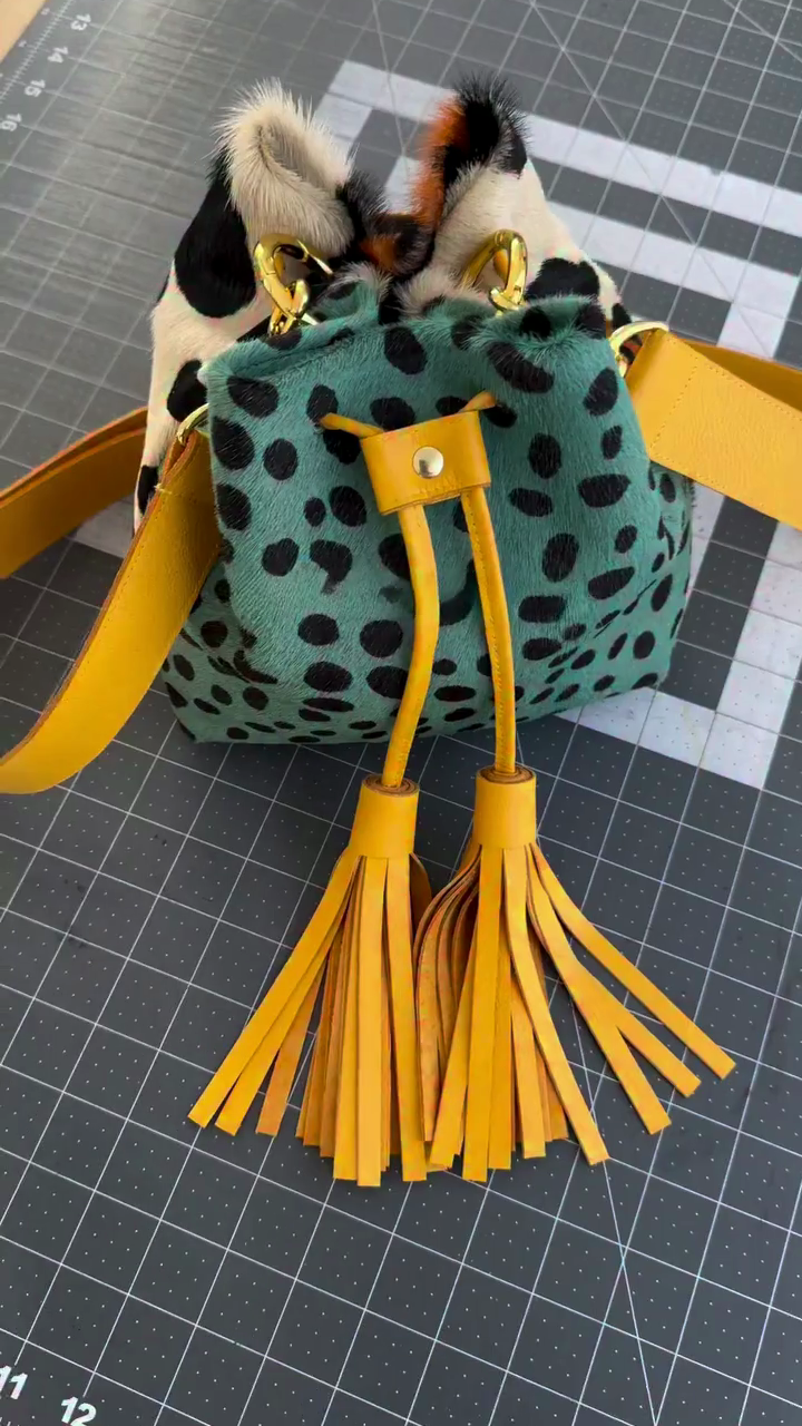 Multi-Tone Cow Print Calf Hair Bucket Bag