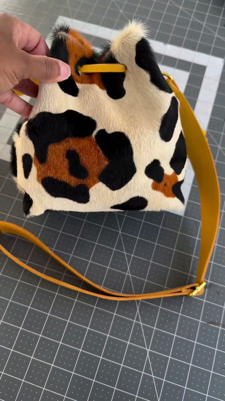 Multi-Tone Cow Print Calf Hair Bucket Bag