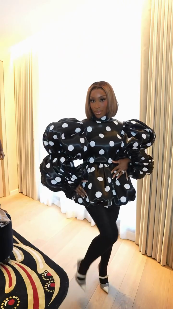 Black Polka Dot Puff Sleeve Peplum Top