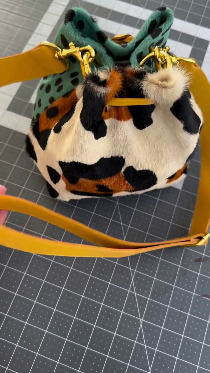 Multi-Tone Cow Print Calf Hair Bucket Bag